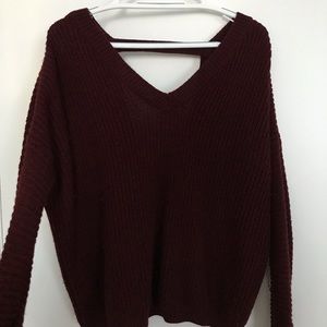 Burgandy knit sweater with back cut outs